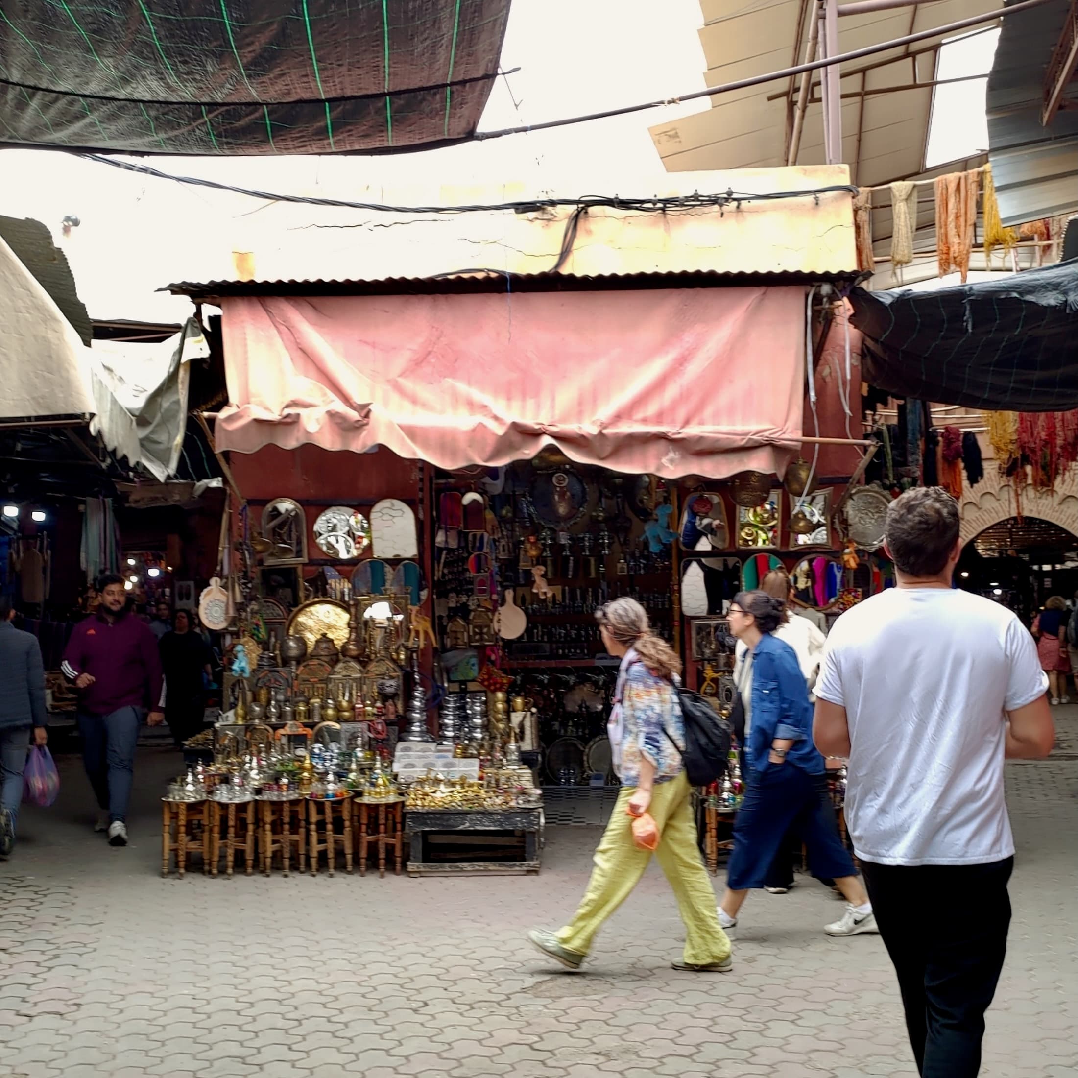 A stall in one of the Souks in the Medina with traditional goods on display